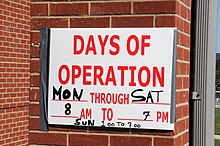 220px FEMA 42163 Hours days of operation sign at the Disaster Recovery Center