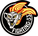 The VF-33 Tarsiers patch featuring "Minky", a tarsier. Fighter Squadron 33 (US Navy) patch 1991.png