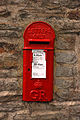 A GR lamp box in a wall at Cutthorpe, Derbyshire
