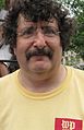 Gene Weingarten, 2010. He wrote this Washington Post article about it: "Dear Wikipedia: Please change my photo!"