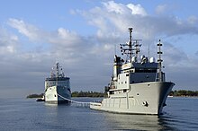 Sioux tows HMCS Protecteur into Pearl Harbor in 2014 HMCS Protecteur arrives at Joint Base Pearl Harbor-Hickam 140306-N-DX698-191.jpg