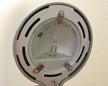 A halogen lamp behind a round UV filter. A separate filter is included with some halogen light fixtures to remove UV light. Halogen.jpg