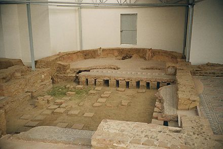Ruins of the hypocaust under the floor of a Roman villa: The part under the exedra is covered.