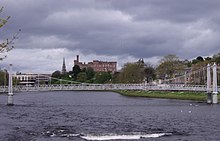 Inverness Castle and River Ness upstream of the Infirmary Bridge Inverness Castle Scotland and River Ness from Ness Walk upstream of the Infirmary Bridge (4584939195).jpg