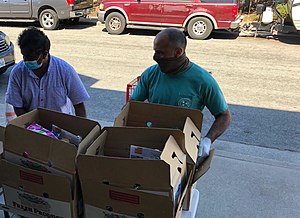 Jimmy Panetta distributing food at the Food Bank for Monterey County 01.jpg