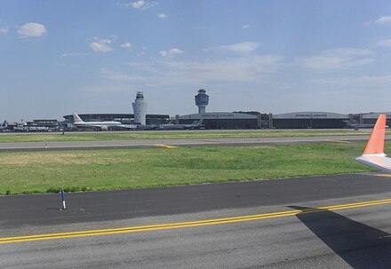 LaGuardia Airport as seen from a taxiway in 2010. Note both the new and old control towers.