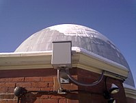 The sky camera mounted near the dome on the roof of the observatory