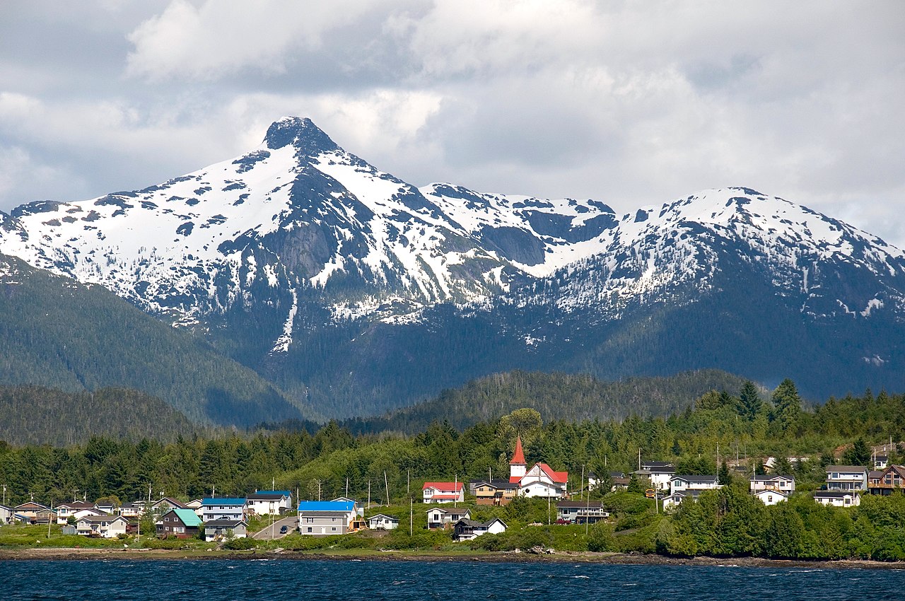 Lax Kw'alaams backdropped by Mount McNeil of the Kitimat Ranges