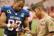 Alexander signing an autograph at the 2013 Pro Bowl Lorenzo Alexander signs autograph.JPG