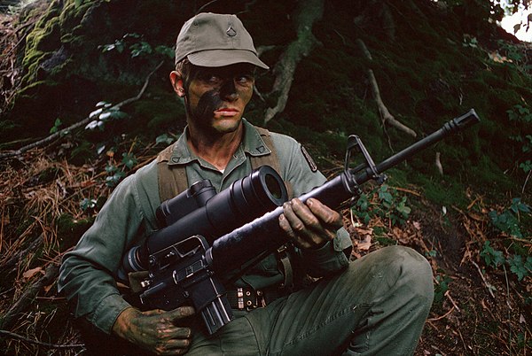 An M16A1 rifle fitted with the AN/PVS-2 Starlight scope