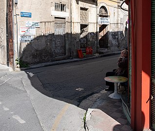 Man sipping coffee, Zinonos Kitieos Street, Nicosia, Cyprus