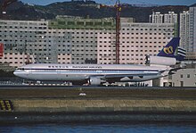 Mandarin Airlines MD-11; B-150 @ HKG, желтоқсан 1994.jpg