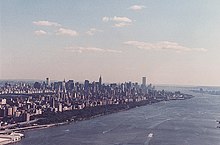 The World Trade Center towers seen from the cockpit of an aircraft over the Hudson River. American Airlines Flight 11 was traveling in roughly the same direction the camera is facing before it crashed. Manhattan from above Hudson River.jpg