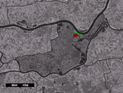 Центр города (красный) и статистический район (светло-зеленый) Россум в муниципалитете Маасдриэль.