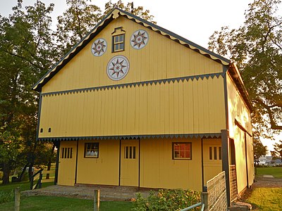 Barn with compass rose hex signs at the historic Mascot Mills in Lancaster County