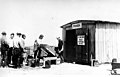 Men weighing in their clam catch, Pacific Ocean beach, Washington, probably between 1910 and 1920 (INDOCC 144).jpg