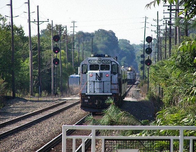 Two Atlantic City Line trains perform a scheduled meet at a passing siding in Cherry Hill