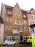 Tenement house (with restaurant) in closed development and rear building