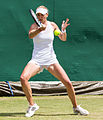 Olga Govortsova competing in the second round of the 2015 Wimbledon Qualifying Tournament at the Bank of England Sports Grounds in Roehampton, England. The winners of three rounds of competition qualify for the main draw of Wimbledon the following week.