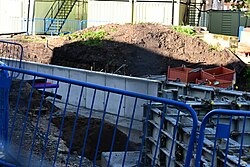 Comparing newly-poured concrete walls, one side still being held in retainers at Queen's Gardens in Kingston upon Hull, currently undergoing major redevelopment works.