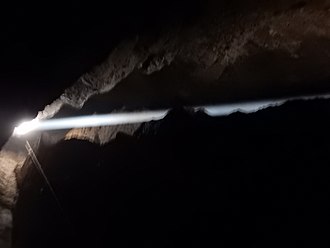 Beam of sun light inside the cavity of Rocca ill'Abissu at Fondachelli-Fantina, Sicily Rocca dell'Abisso, Fondachelli Fantina, Sicilia.JPG