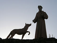 A statue of Francis with the wolf. San-francesco.jpg