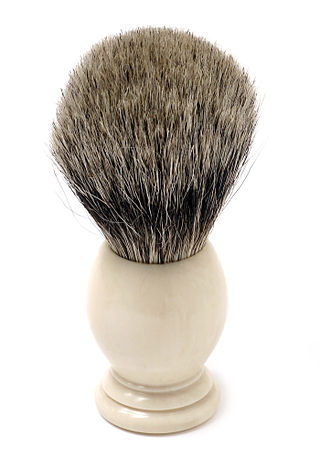 <span class="mw-page-title-main">Shaving brush</span> Tool to make and apply shaving soap or cream