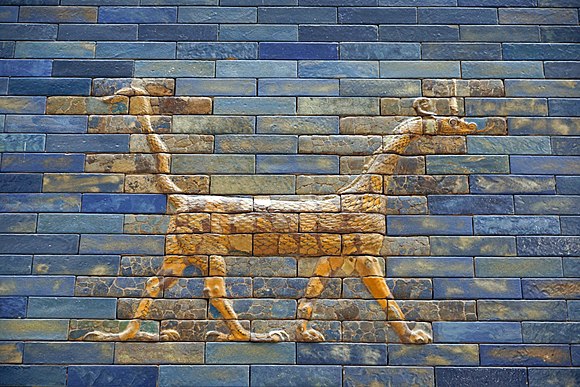 The mušḫuššu is a serpentine, draconic monster from ancient Mesopotamian mythology with the body and neck of a snake, the forelegs of a lion, and the hind-legs of a bird.[58] Here it is shown as it appears in the Ishtar Gate from the city of Babylon.[58]