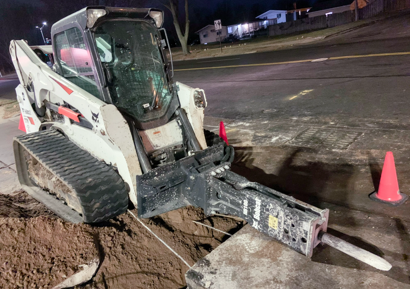 File:Skid steer jack hammer.webp