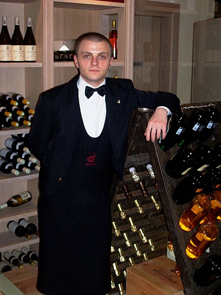 File:Sommelier with restaurants wine collection.jpg