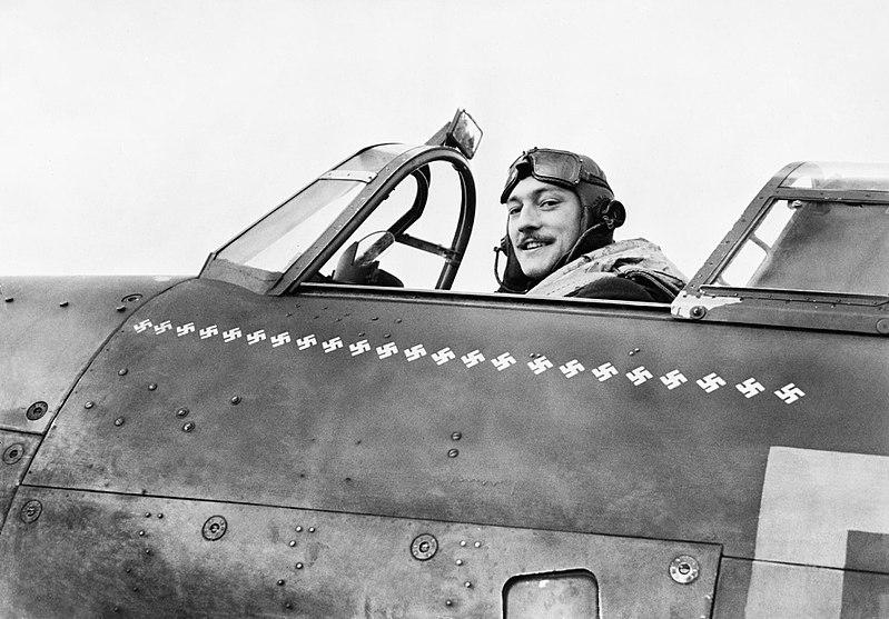 File:Squadron Leader Robert Stanford Tuck, commanding No. 257 Squadron, in the cockpit of his Hawker Hurricane at Martelsham Heath, November 1940. CH1680.jpg