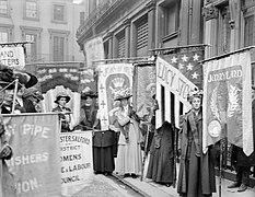 Suffragettes taking part in a pageant by the National Union of Women’s Suffrage Societies, June 1908.jpg