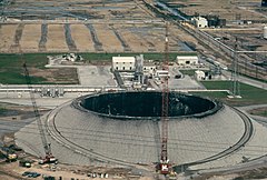 THE TEXAS EASTERN GAS TANK THAT KILLED 41 WORKMEN WHEN IT IMPLODED IN JANUARY 1973, IS NOW BEING REBUILT OVER THE... - NARA - 551983 (Color adjusted).jpg