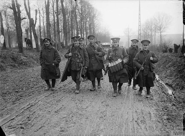 British troops returning from leave, Mailly Maillet, November 1916. The group of soldiers includes men of the Lancashire Fusiliers, York and Lancaster