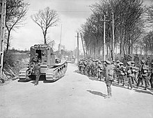 Whippets of 3rd Battalion at Maillet-Mailly on 26 March 1918. Some, in action earlier in the day, were the first Whippets to be used. (Infantry are of the New Zealand Division.) The German Spring Offensive, March-july 1918 Q9821.jpg