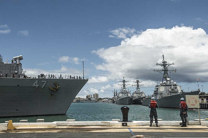 File:The amphibious dock landing ship USS Rushmore (LSD 47), left, prepares to moor at Joint Base Pearl Harbor-Hickam, Hawaii, June 27, 2014, to participate in exercise Rim of the Pacific (RIMPAC) 2014 140627-N-TQ272-128.jpg