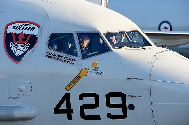 File:U.S. Navy Lt. Cmdr. David Mims, left, and Lt. j.g. Brent Nelsen, naval aviators assigned to Patrol Squadron (VP) 16, perform preflight checks on a P-8A Poseidon aircraft before a mission in Perth, Australia 140402-N-VD564-026.jpg