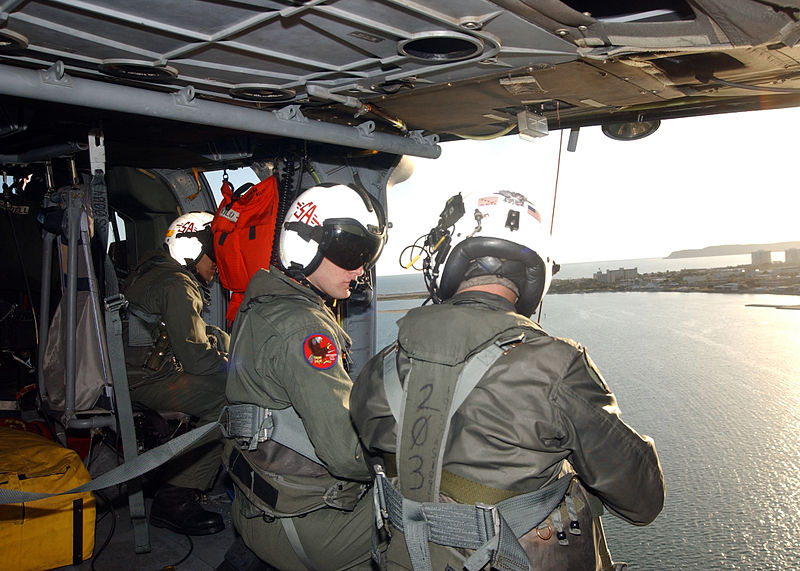 File:US Navy 050427-N-9500T-098 Aviation Structural Mechanic 3rd Class Luigi A. Caprio, left, learns how to operate the rescue hoist aboard a MH-60S Seahawk helicopter from his instructor.jpg