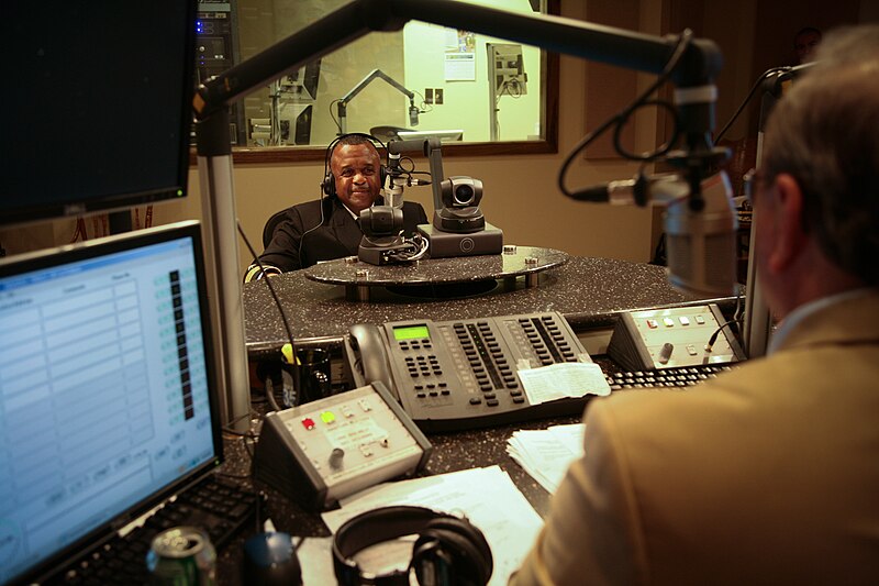 File:US Navy 110321-N-YM440-018 Rear Adm. Arthur J. Johnson, commander of Naval Safety Center, conducts a radio interview with Paul Gallo on Super Talk.jpg