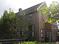 This is an image of rijksmonument number 478478 Vrede en Recht, two houses at Meidoornlaan 39-41, Veenhuizen.
