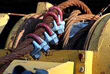 Clamps securing wire rope on logging equipment Wire rope clamps.jpg