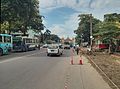 Streetview in downtown Yangon, Botahtaung Road, entrance gate of Botahtaung Pagoda in the background, August 2013