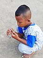 "+arya+" child play with calotes versicolor - Pilangsari 2020.jpg