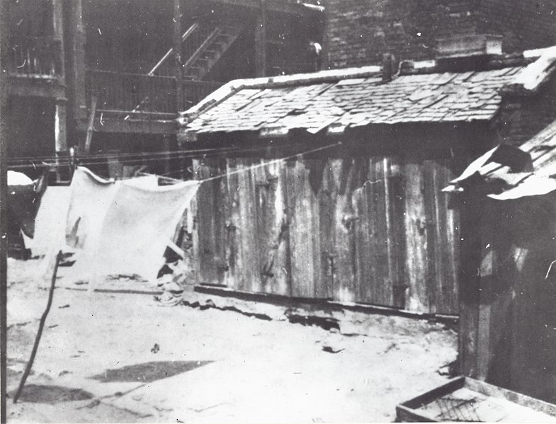 File:"80 People use these five vaults." Image of an outhouse from a poster created by the Housing and Sanitation Committee Civic League pushing for the abolition of public outhouses.jpg