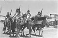 'Coronation' of King Abdullah in Amman. Colour party 'Lowering the Colors' when passing saluting base before the king. Corps Elite LOC matpc.14992.jpg