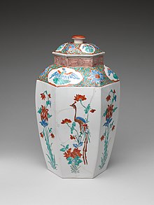 Hexagonal jar decorated with flowers and birds, late 17th century, porcelain with overglaze enamels, height: 31.1 cm, diameter: 19.1 cm, Metropolitan Museum of Art (New York City) Se Hui Hua Niao Wen Ba Jiao Da Hu You Tian Shao  * Shi You Wei Men Yang Shi -Hexagonal jar with Flower and Bird Decoration (one of a pair) MET DP281207.jpg