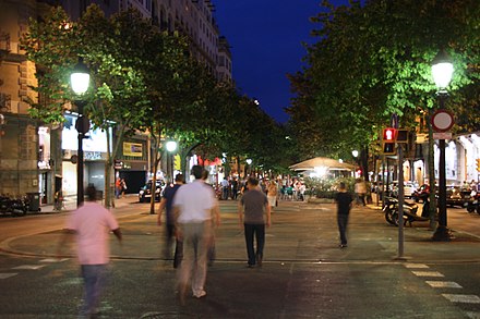 Pedestrians in Barcelona jaywalking with red light