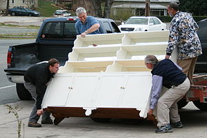 2008-03-11 Men lifting a dresser.jpg