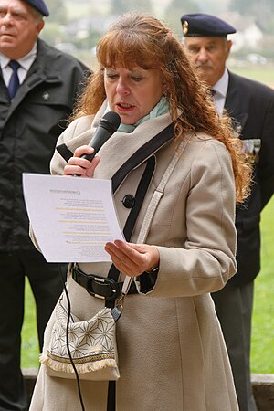 Poème de Murielle Munier, accompagnée des enfants de l'école de Banvillars.