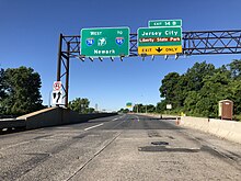 I-78, the New Jersey Turnpike Newark Bay Extension, westbound at Exit 14B in Jersey City 2018-07-08 08 23 07 View west along Interstate 78 (New Jersey Turnpike Newark Bay Extension) just east of Exit 14B (Jersey City, Liberty State Park) in Jersey City, Hudson County, New Jersey.jpg